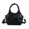 Nova bolsa de balde vintage transfronteiriça para mulheres, bolsa de grande capacidade com design único, bolsa de ombro de nicho, bolsa transversal moderna para mães