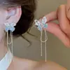 Esencial para citas~Pendientes de borla de mariposa etéreos estilo francés, diseño de nicho de lujo ligero, pendientes dulces de alta gama