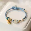 Nuevo Pulsera de Hebilla Ping An Imitación Hetian Yu Diseño de Nicho Femenino Cadena de Eslabones Cuerda de Mano de Perla Tejida Regalo para Novia