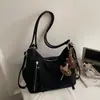 Nueva mochila retro 2026 para mujer, colección otoño/invierno, con un diseño lindo y elegante, gran capacidad, bolso de hombro casual y un bolso tote moderno y minimalista