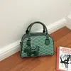Bolso de Concha con Estampado de Moda 2026 Verano Nueva Moda Simple Elegante Nicho Versátil de un Solo Hombro Cruzado de Mano