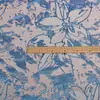Tela jacquard metálica azul con diseño de plantas y flores para vestidos, ropa y materiales decorativos de diseñador