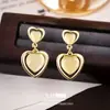 Pendientes de Ojo de Gato Geométricos Simples Estilo Coreano, Modernos y Elegantes, Pendientes en Forma de Corazón con Diseño Único y Accesorios Versátiles
