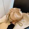 2023 nuevo bolso bandolera de cadena estilo Chanel versátil bolsa de cubo portátil rombos bolso de hombro bandolera nicho al por mayor