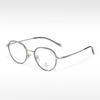 Gafas de montura ovalada pequeña y fresca, pegamento dorado de moda T22055, semi-titanio, se pueden equipar con montura óptica para miopía, anti-luz azul