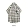 Camisa a cuadros retro estilo Hong Kong para hombre, manga corta de verano, marca de moda americana, etiqueta, chaqueta de camisa casual holgada de alta calidad