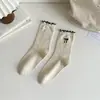 [Xinke Li Jian] calcetines de oreja de madera para mujer, calcetines de tubo medio para primavera y otoño, con lazo, estilo ins simple y versátil, calcetines para estudiante
