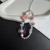 Correa de teléfono de cuentas de dibujos animados dulce y genial con diseño de cachorro West Highland y frijoles M&O, adecuada para bolsas de cámara CCD y como accesorio de bolso