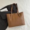 Bolsa feminina com textura de grande capacidade e handicap da maré de primavera 2025, nova bolsa vintage da moda, bolsa de ombro, mão e axila para mulheres