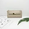 Cartera de Mujer Nueva de Estilo Largo Transfronteriza, Color Sólido Simple, Bordado Vintage de Alta Gama, Cartera de Mujer con 70% de descuento, En Stock para Venta al por Mayor