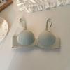 Sutiã meia-taça sem costura, estilo push-up, sem aro, com acabamento brilhante, fabricado no Sudeste Asiático. Ideal para mulheres com seios pequenos.