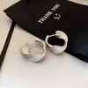 Estilo indiferente europeo y americano tejido de punto trenzado ear cuff simple luz de lujo diseño de nicho aretes moda de alta gama joyería de oído versátil