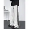 2026 Nuevo Estilo Americano Casual Tres Rayas de Moda Versión Coreana Corte Holgado Moda de Alta Gama Pantalones de Chándal Talla Grande