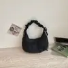 2026 Nuevo Bolso de Hombro Único Plegado Estilo Coreano Bolso de Axila con Sentido de Diseño de Nicho para Mujer Bolso Simple Versátil para el Trabajo