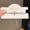 Pulsera extensible de cruz de circonita chapada en oro real de 18 quilates, estilo nicho de alta gama, joyería versátil y elegante para mujer