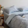 Juego de cuatro piezas de algodón puro a rayas estilo japonés, juego de sábanas y fundas de edredón 100% algodón modelo nuevo 2026, juego de tres piezas para ropa de cama de dormitorio estudiantil