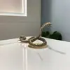 Año Nuevo de la Serpiente Mini Llavero Colgante Pitón Venta Caliente Transfronteriza Accesorios de Animales Fabricante de Cobre Viejo Venta al por Mayor