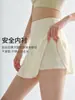 Falda corta deportiva para mujer 2026 verano dos piezas anti-exposición falda de yoga para correr y fitness talla grande bádminton falda plisada