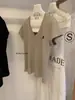 Wgwe9158 Guangzhou Shisanxing Camiseta de Verano Nueva para Mujer con Bordado de Caballo Cuello en V Manga Corta Adelgazante Top Casual