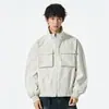 Chaqueta de moda de alta calle para primavera y otoño 2025 con cuello alto, corte holgado, diseño multibolsillos, resistente al viento, moderna