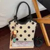 Exquisito Bolso de Lunares de Nicho para Mujer 2026 Nueva Moda Bolso Cruzado Versátil con un Toque de Lujo y Elegante Bolso de Mano Bolso Cubo