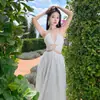Vestido de Playa Vacacional Costero Sanya con Cuello Halter, Bordado Calado, Vestido Largo sin Espalda, Color de la Foto