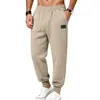 Pantalones jogger de hombre de color liso con textura estilo americano para otoño, pantalones deportivos largos casuales para hombre con cintura elástica y cordón