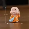 Paisagem miniatura criativa travessa quatro-não mongezinho Zen acessórios decorativos, pequena estatueta de monge para carro, desktop ou mesa de chá