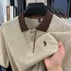 Camiseta de punto de manga corta para hombre, nuevo estilo de verano, jacquard de punto, manga corta, versión coreana, casual, bordada, moderna, cuello camisero, ultra delgada