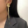 Pendientes largos de borla de flor de temperamento de dama dulce y gentil, moda elegante, alto sentido del diseño, pendientes de viento frío