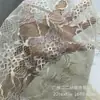 Tela de encaje sexy de primavera y otoño, falda de encaje bicolor calada, abrigo, material de tela de encaje