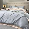 Juego de ropa de cama de cuatro piezas de seda helada lavada de alta gama con bordado, tacto lujoso, funda de edredón de verano, sábana bajera, juego de tres piezas para cama individual