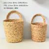 Cesta de Armazenamento Trançada de Capim Marinho Cesta de Pendurar na Parede Prateleira de Armazenamento Ornamento Cesta para Plantas de Jardim Cesta Pendurada Trançada de Juncos Vaso de Flores Pendurado