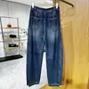 Pantalones vaqueros de algodón lavado estilo neutro coreano, nuevo producto de otoño 2026, corte holgado, adelgazantes, vaqueros curvos casuales para mujer