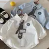 Camisas para Niños 2026 Otoño Nuevo Estampado Digital Dibujos Animados Camisas Personalizadas Bebé Estilo Coreano Versátil Camisas de Algodón de Color Sólido