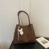 Bolso grande de mujer transfronterizo, nuevo estilo verano 2026, versátil y moderno, de un solo hombro, moderno, para la ciudad, retro, casual, tipo tote