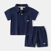 Traje de Manga Corta para Niños 2026 Verano Nuevo Estilo Coreano Camisa Polo de Color Sólido para Niños Top y Pantalones de Cinco Cuartos Conjunto de Dos Piezas Venta al por Mayor