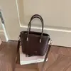 Bolsa Shuai Mi Jia con patrón tejido de nicho para mujer, nuevo bolso cruzado de moda de verano 2026, bolso de mano exquisito, bolso tipo cubo