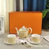 Juego de Té y Café de Lujo Ligero Estilo Europeo Transfronterizo Simple de Una Olla Doble Taza y Platillo Olla Baja con Cuchara Dorada de Estándar Original Juego de Siete Piezas para el Té de la Tarde