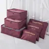 Neceser de viaje estilo coreano Juego de seis piezas Neceser Impermeable Bolsa organizadora de ropa Malla fina engrosada Juego de 6 piezas para maleta