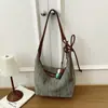 Bolso de mujer versátil y moderno de diseño de nicho transfronterizo otoño 2026 nuevo para el trabajo con tacto de alta gama, de un solo hombro, cruzado, tipo empanada