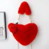 Bolso de mano transfronterizo con forma de corazón de felpa, bolso de hombro y bandolera para mujer, bolso de cadena de piel sintética de conejo, bolso lindo con forma de corazón, modelo nuevo