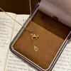 Collar Coreano de Moda Trendy de Acero de Titanio con Diseño de Poni y Moneda, Atrae Instantáneamente Riqueza, Cadena para Clavícula con Borla, Moderno y Versátil