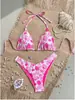 Traje de baño nuevo estilo europeo y americano 2026 con estampado, cordones, bikini sexy de tres piezas, trajes de baño, transfronterizo