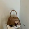 Bolso de mano retro transfronterizo para mujer, gran capacidad, nueva moda 2026, bolso de hombro de nicho para el día a día, elegante bolso de axila
