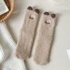 Calcetines de mujer de otoño e invierno de felpa de coral, con expresión divertida, de dibujos animados, de tubo medio, cálidos, cómodos para dormir.
