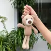 Chaveiro de pelúcia Urso de Pelúcia pingente de boneca urso conjunto de três peças cachecol boneca urso urso palito atacado