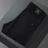 Jeans Blancos de Alta Gama Europeos Lyocell Tencel Tres Pruebas para Hombre en Otoño Nuevo Ajuste Delgado Pierna Pequeña Elásticos Casual Tendencia