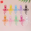 Nuevo Colgante de Hebilla de Puerta con Lazo Hueco Accesorios de Material DIY Llavero Hebilla de Puerta Hebilla Decorativa Mochila Colgante Pequeño