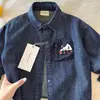 Camisa de mezclilla suave de otoño para niños, nuevo estilo primavera/otoño 2026, camisa de manga larga para niños pequeños y mayores, prenda exterior de moda